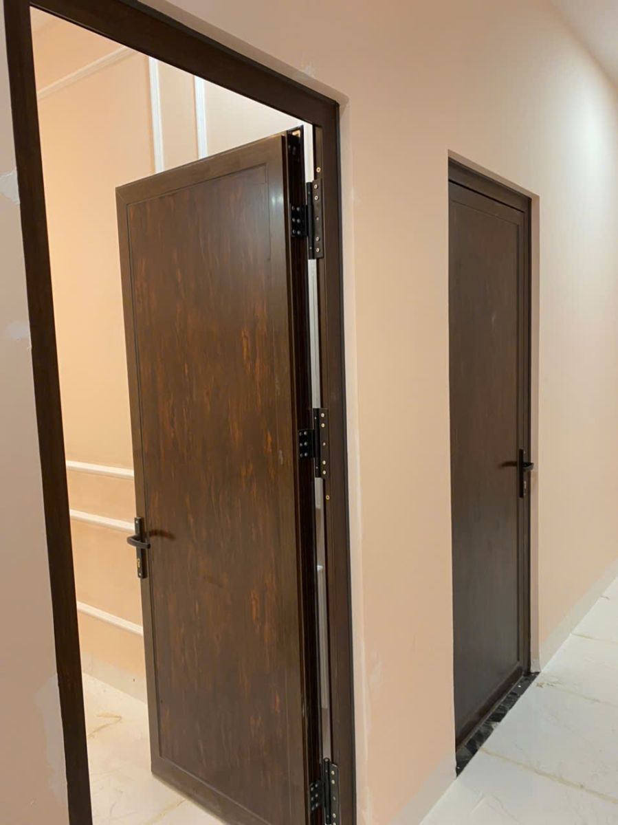 Đơn Vị Thi Công Nhôm Kính Nhôm Kính Thành Tài Lắp Đặt Cửa Nhôm Vân Gỗ Sang Trọng